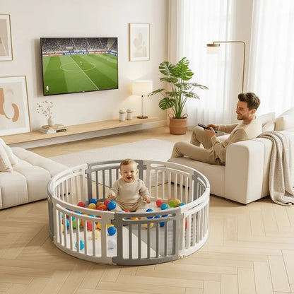 parc bébé modulable papa regarde la télé